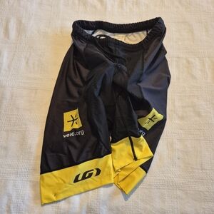 Louis Garneau men's size Medium black & yellow cycling shorts, marks on leg GUC